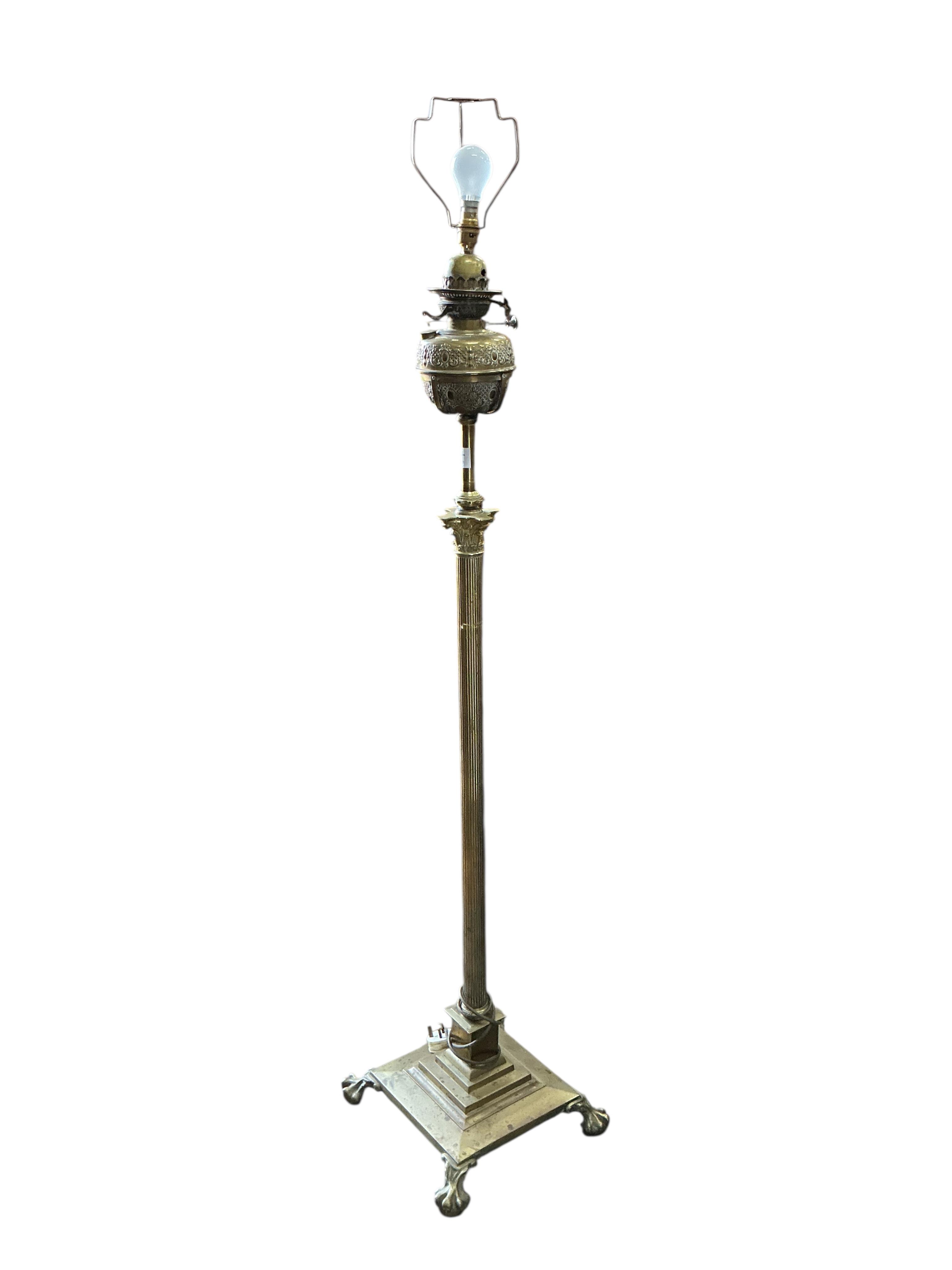 A Victorian brass telescopic Corinthian column standard lamp, converted to electricity